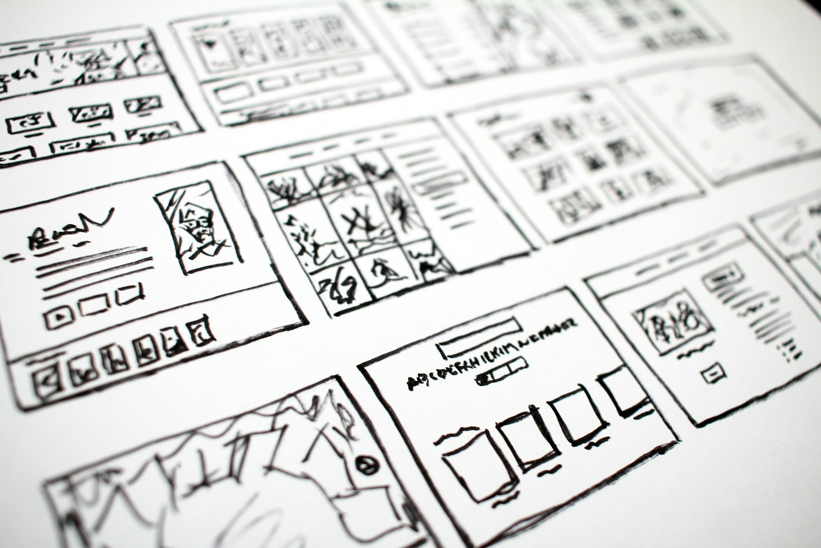 tvOS layouts, black and white doodles.